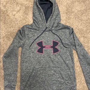 Woman’s under armour sweatshirt.